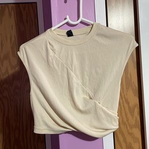 Cream ribbed asymmetrical high neck crop top